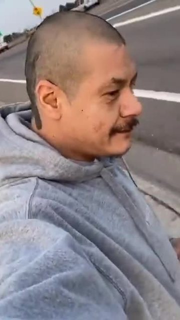 Dreams skateboard template thumbnail, a man in a grey hoodie filming himself on the road